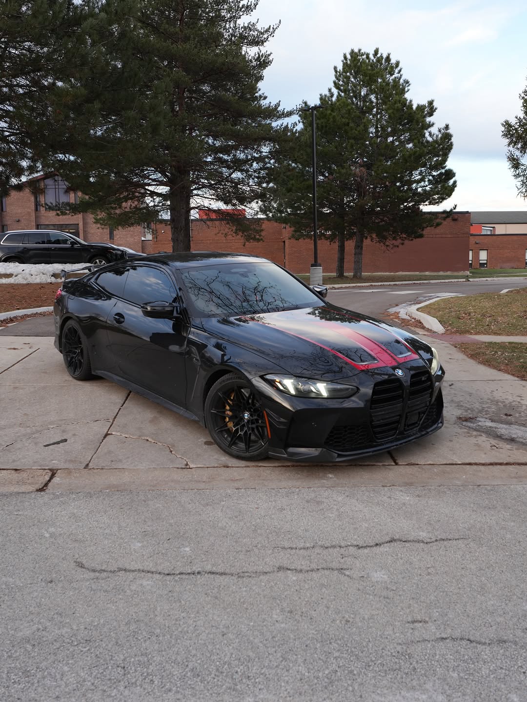 2025 BMW M4 black-on-black ceramic tint by Tint Starz